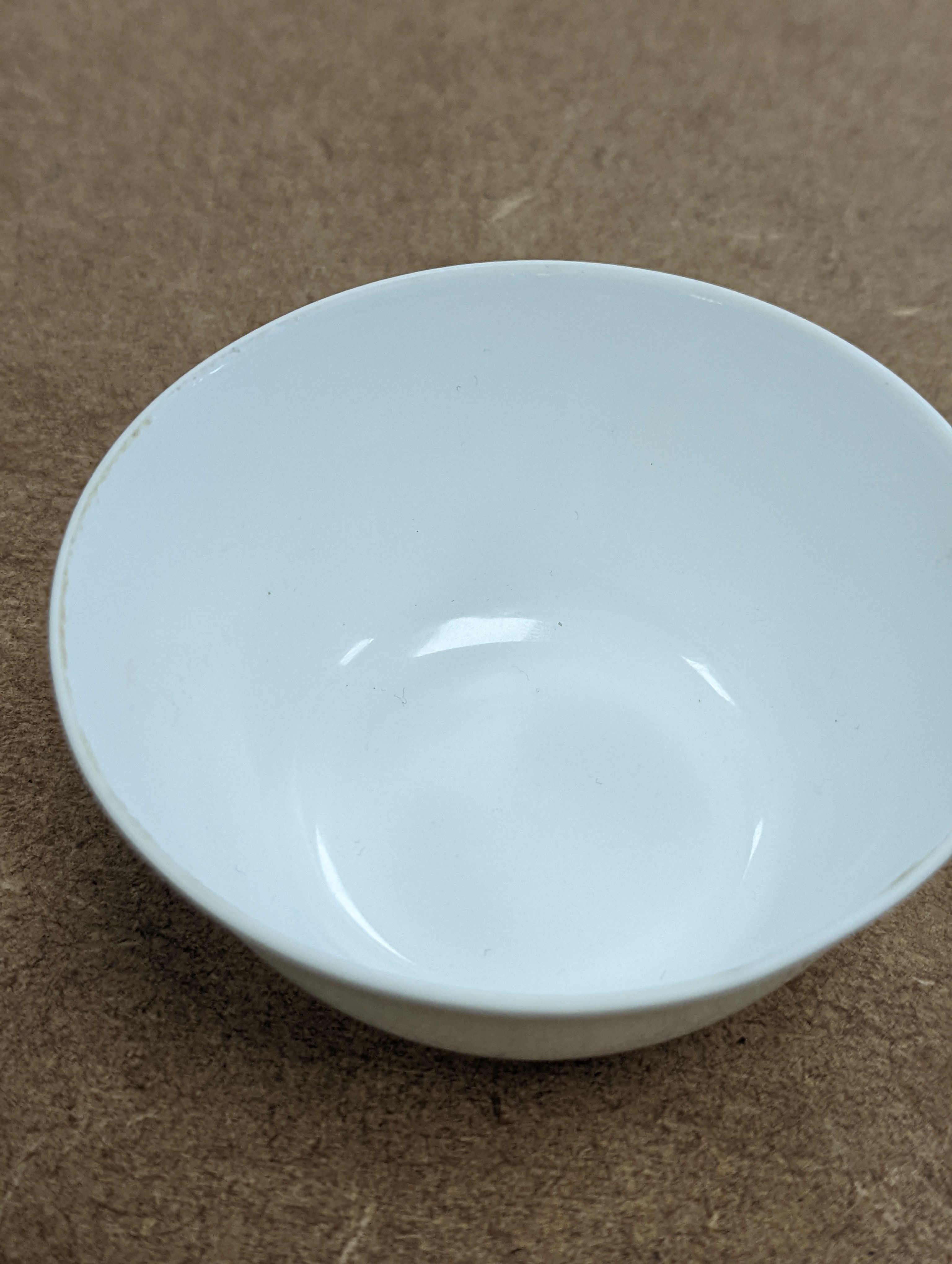 A Chinese white glazed water pot and a similar cup (2)